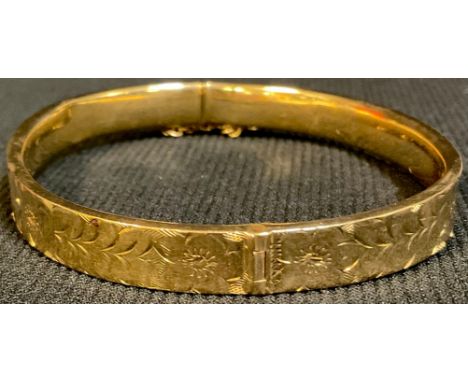 A 9ct gold hollow hinged bangle, 10.6g 