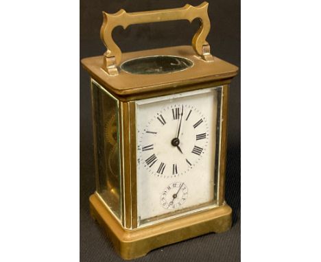 A late 19th/early 20th century French brass carriage timepiece, Roman numerals on white enamel dial with Arabic numeral alarm