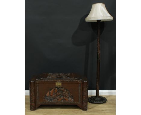 A Chinese inspired hardwood blanket chest, 58cm high, 100.5cm wide, 54cm deep; a similar standard lamp, 158cm high under fitt