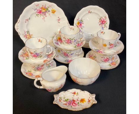 A Royal Crown Derby Posie pattern tea set, comprising six cups, saucers and tea plates, milk and sugar, sandwich plate, a tri