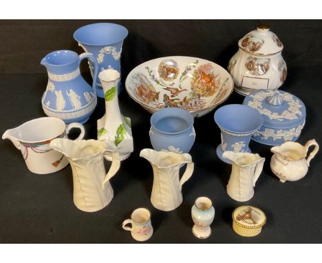 A Wedgwood Blue Jasper ware jug, typically spriged in white with classical figures, 20th century;  similar vases;  trinket bo