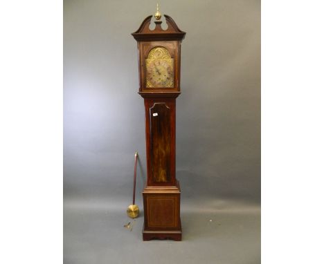 A mahogany longcase clock with brass dial, Roman numerals and silvered chapter ring, bears plate 'C.S. Smith, Scarborough', t