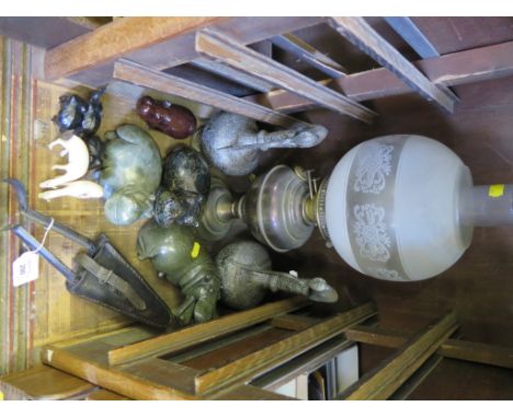 Three carved hardstone hippo figures, a pair of sheep sheers, an oil lamp and other ornaments