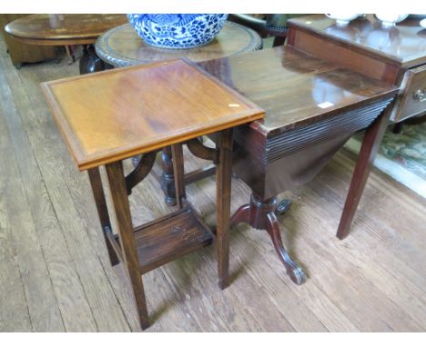 A Victorian sewing table, the square hinged top with tapering sides on a tripod base, 48cm wide