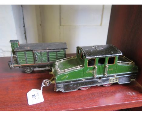 Marklin: O gauge electric 0-4-0 Steeple cab locomotive V3120 (lacks pantograph) and break van with electric rear lighting, bo