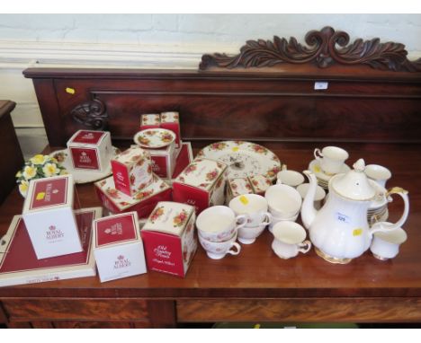 Royal Albert Old Country Roses: Various ornaments in associated boxes, a bread plate and wall clock, a Gainsborough tea servi