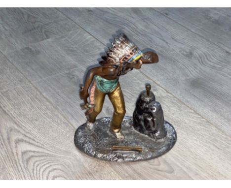 A cast metal Native American Chief table light striker