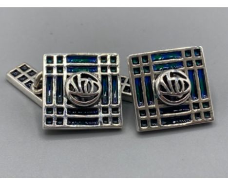 A pair of silver and enamel set Tiffany style cufflinks, 12.6g
