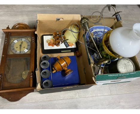 Box of iron trivet large willow pattern meat plate, wall clock and box of Majolica planter electric faux oil lamp aynsley che