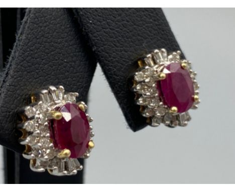 A pair of 14ct white gold substantial ruby and diamond earrings 2.5ct’s approx., 3.8g