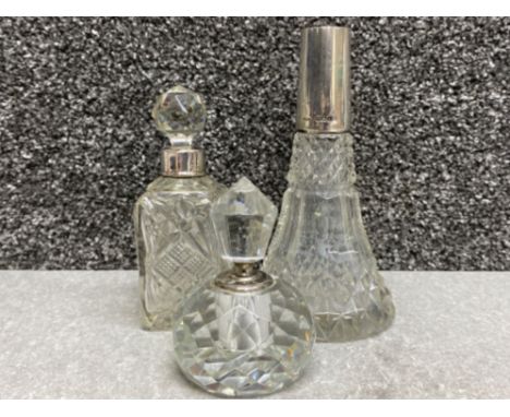 Vintage glass perfume bottle with stopper together with 2x Antique hallmarked Birmingham silver rimmed bottles (one with stop