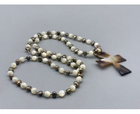 Mother of pearl cross pendant with a freshwater pearl and mother of pearl beaded necklace