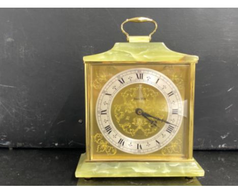 A reproduction jade and brass style mantle clock by James White