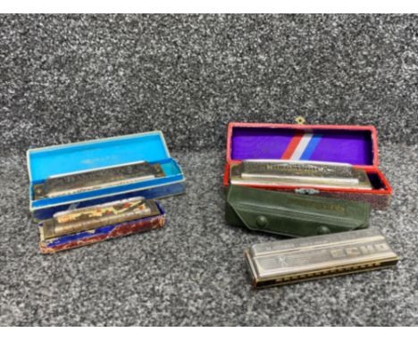 A lot consisting of 4 harmonica to include Echo, Super Chromonica etc