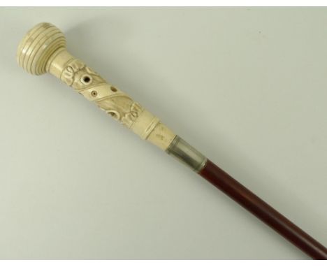 A Victorian stained beech 'smell me' walking stick, the screw top bone handle carved with leaves, belt and chain design, plat