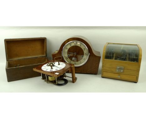 A 1930's mantel clock with deco inlay, and a collection of watchmakers tools, including a vice, and items for cog and wheel m