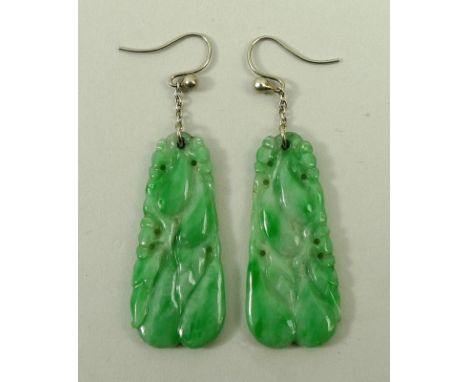 A pair of jade drop earrings carved with fruit, on fish hook fittings, 4.8g, 34mm long.