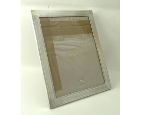 A Mappin and Webb silver rectangular strut photograph frame with engine turned decoration, Birmingham 1914, Mappin & Webb, 28