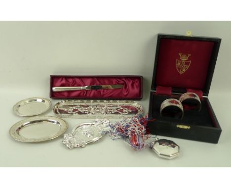 A pair of silver napkin rings embossed with ferns, Birmingham 1987, boxed, paper knife, Sheffield 1989, boxed, a compressed o