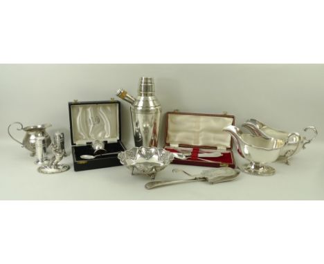 A silver 'Man in the Moon' egg cup and spoon, Birmingham 1959, boxed, child's knife, fork and spoon, Sheffield 1963, boxed, 3