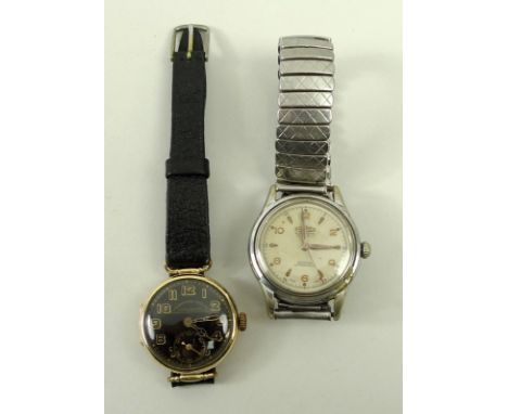 A Courvoisier Freres 14ct gold cased lady's wristwatch, black enamel dial bearing Arabic numerals, subsidiary seconds dial, S