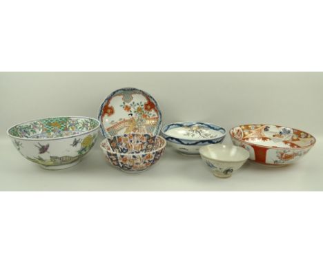 A group of ceramic bowls, comprising a Japanese rice bowl painted with figures, 7 by 13cm, an Imari patterned fluted bowl, 19
