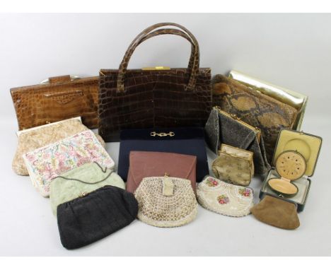 A quantity of lady's vintage handbags, comprising a snakeskin bag, a crocodile leather bag, and a number of beaded evening ba