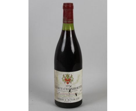 Vintage Wine: a bottle of Gevry-Chambertin, Domaine des Varoilles, Cote d'Or, 1979, U: 2cm.
Provenance: From the Cellar of Ke