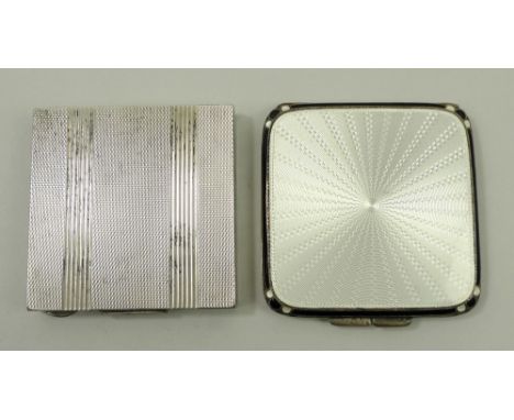 A silver compact of curved, square form, decorated with white guilloche enamel with a black and white enamel border, Birmingh