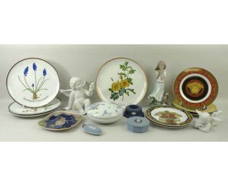 A group of ceramics comprising two Rosenthal bisque cherubs, a Lladro figure of a girl holding mussels, four Versace Rosentha