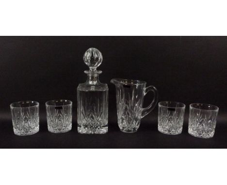 A Thomas Webb cut glass square whisky decanter and stopper, 27cm, water jug, 17cm, and four tumblers. (6)