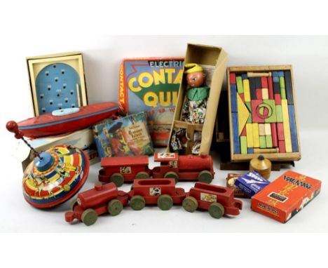 A collection of vintage toys including a Chad Valley miniature bagatelle board and tin plate spinning wheel, a boxed clown Pe