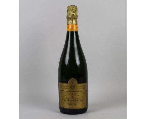 Vintage Champagne: a bottle of Veuve Clicquot Ponsardin Champagne, Brut, 1989, Trilennium Reserved Cuvee, U: 1.5cm inverted.