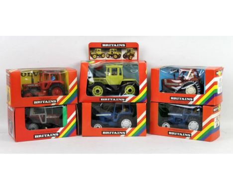 A collection of Britains tractors, mint and boxed, comprising; Mercedes Benz Tractor 9525, Ford TW20 Tractor 9523, Flat Half 