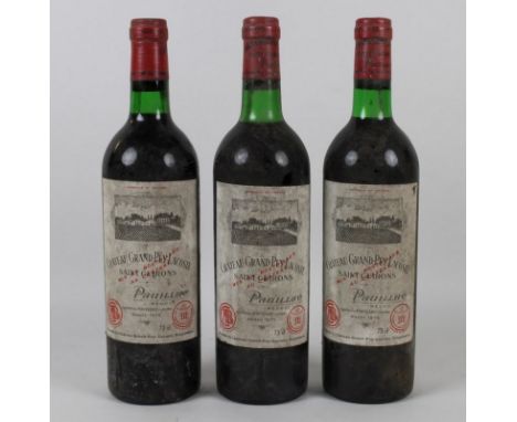 Vintage Wine: three bottles of Chateau Grand-Puy-Lacoste, Saint Guirons, 5eme Cru Classe, Pauillac, 1975, U: all base neck or