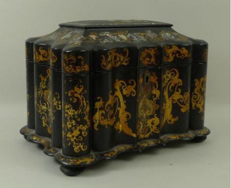 A Victorian papier mache and mother of pearl inlaid tea caddy, of fluted rectangular form, with hinged lid to the divided, li