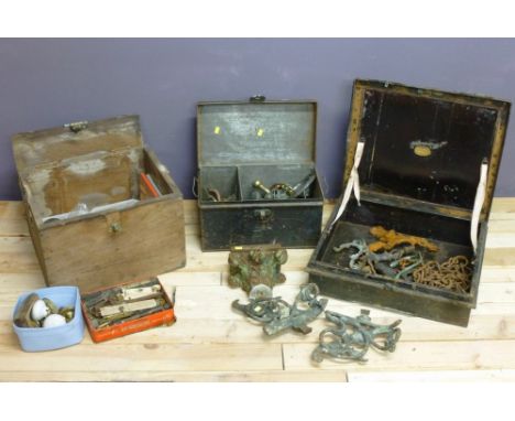 A quantity of Georgian and later door furniture, including brass, ceramic and wooden handles, and iron locks and various hook