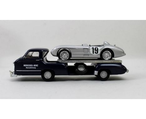 A Conrad Mercedes Benz 1955 Racing Car Transporter with Car 103402, three Oxford Automobile Company models of Jaguars, scale 