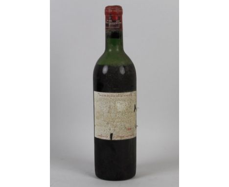 Vintage Wine: a bottle of Chateau Cos d'Estournel, 2eme Grand Cru Classe, Saint-Estephe, 1958, U: mid shoulder.
Provenance: F