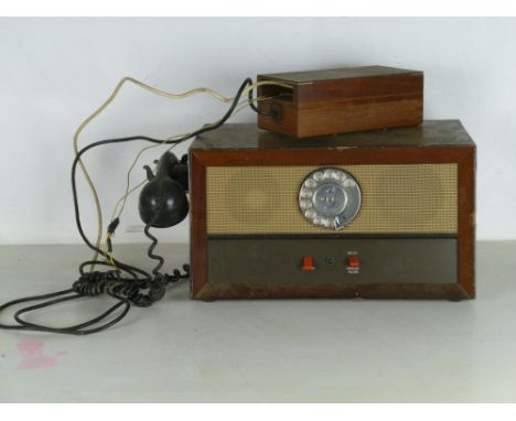 A 1950's loud speaker telephone, No 28 - Gen 85, with receiver and a dial on the switch board box, 45 by 25 by 21cm high.