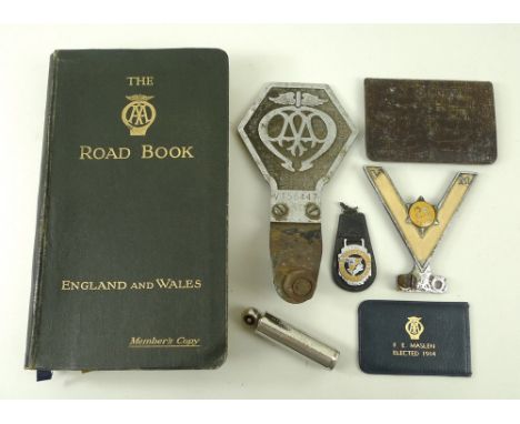 An AA car badge, V156447, Veteram Motorist's 25 years enamel and chrome badge, National Benzole Mixture key fob, AA member's 