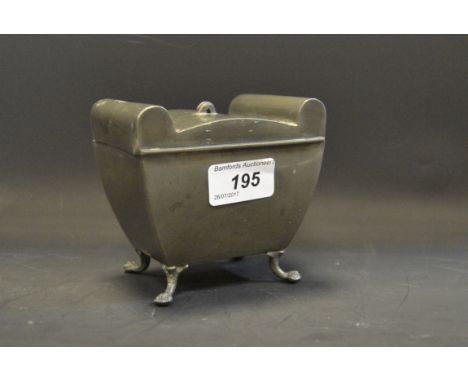 A pewter tea caddy