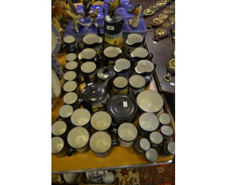 Ambleside Pottery - stoneware pottery, painted with a Dragon , consisting of a coffee pot, teapot, jugs; coffee cups and sauc