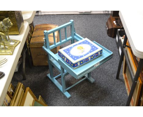 A child's high chair, painted blue; a 1950's childs tea service, boxed (2)