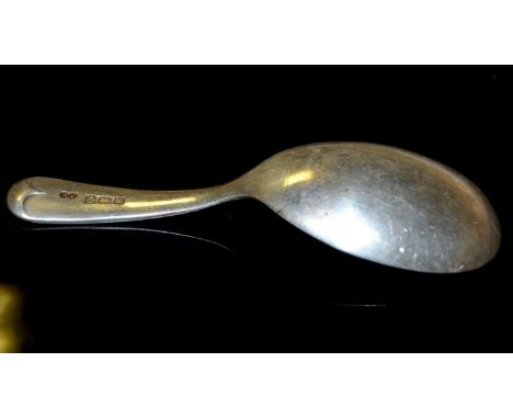 A George III style silver caddy spoon, feather-edge, Birmingham 1973
