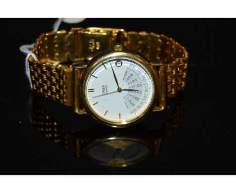 A Timex Quartz gilt metal gentleman's wristwatch, date aperture
