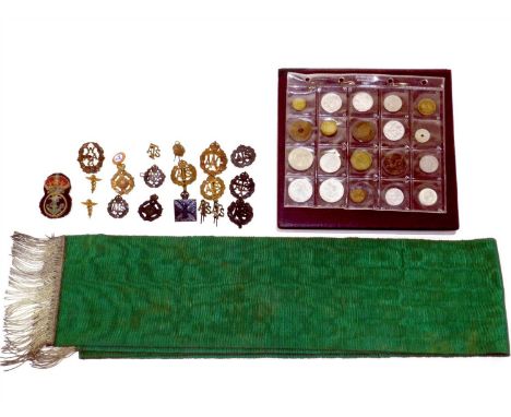 A small collection of military badges, mainly women’s cap badges including A.T.S, W.A.A.F, Naval cloth badge together with a 