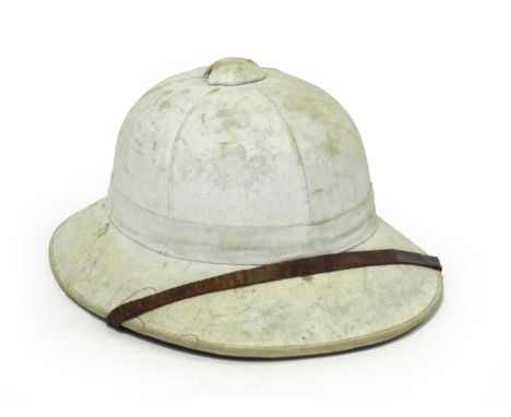 A WW2 British pith helmet, dated 1942 - size 7, manufacturers stamp indistinctly reads ‘St Albans’, with brown leather liner 