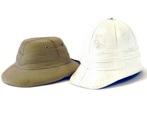 A mid-20th century Indian made khaki pith helmet together with a white painted pith helmet lacking liner (2)