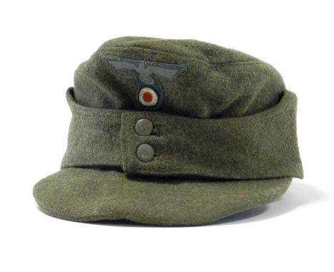 A German Third Reich Heer Army M43 NCO/EM Field/Ski Cap (Einheitsfeldmütze M43 für Mannschaften) constructed in field grey wo